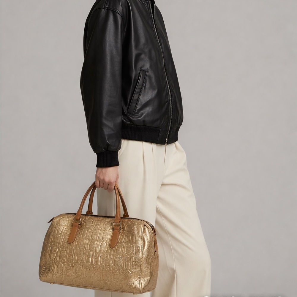 Carolina Herrera Metallic Gold Monogram Embossed Leather Andy Boston Bag.